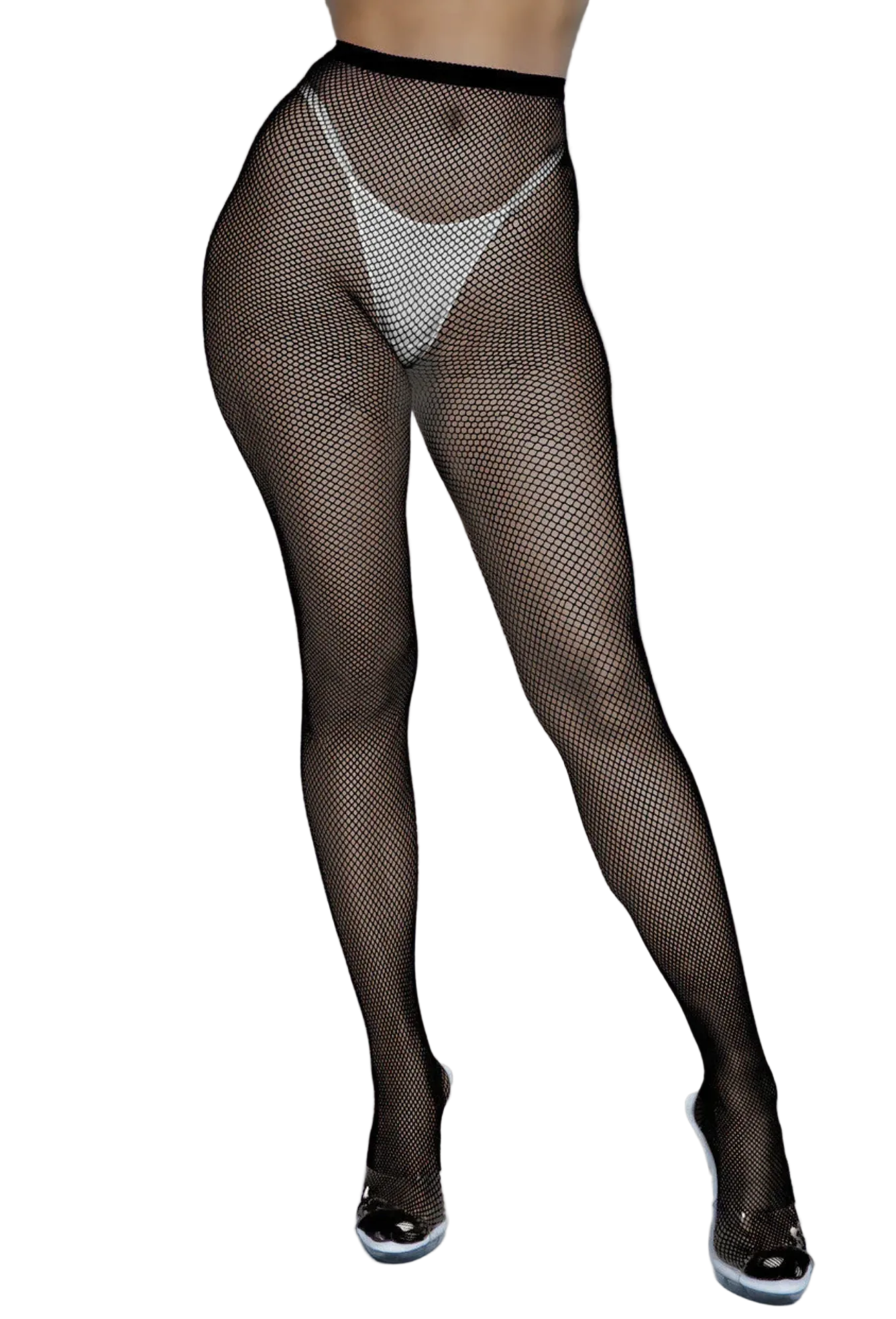 Black fishnet stockings worn by a person on a black background