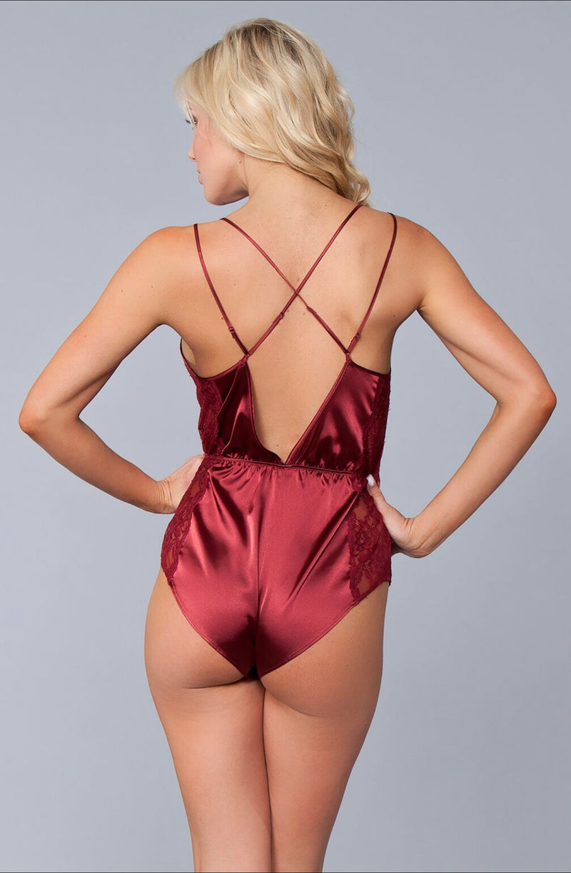 Satin with lace trim, plunging neckline, pulls on cheeky coverage, criss-cross front.