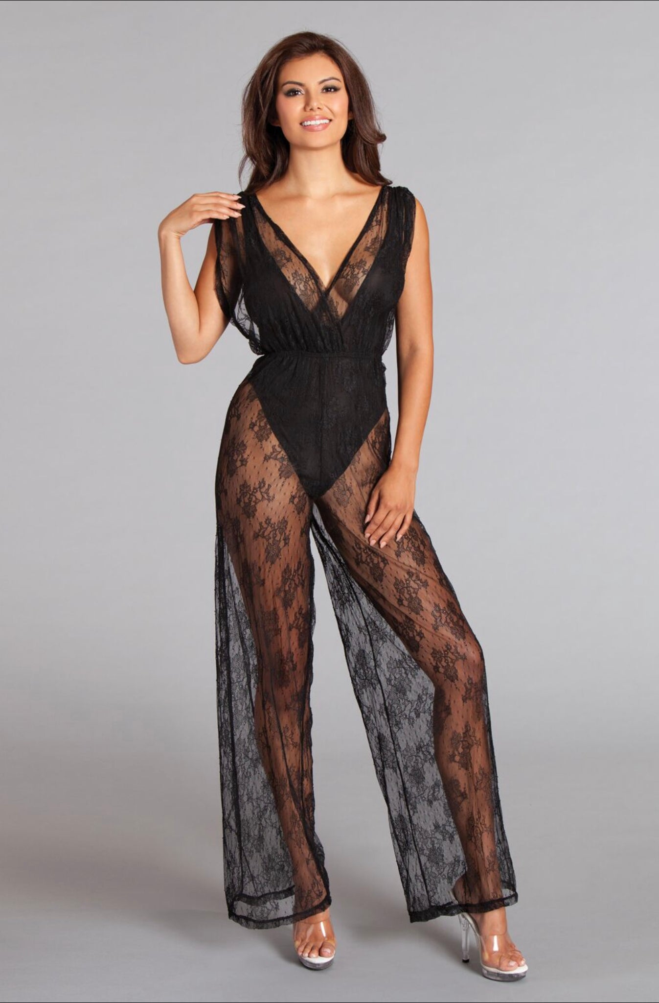 ROCK WITH YOU JUMPSUIT LACE OVERLAY JUMPSUIT WITH BODYSUIT LINING. SHIRRED CROSSOVER FRONT AND WIDE LEGS