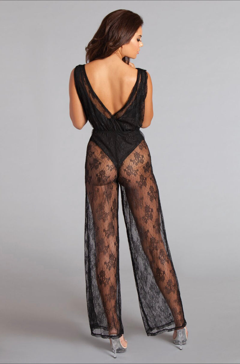 Lace overlay jumpsuit with bodysuit lining. Shirred crossover front and wide legs.